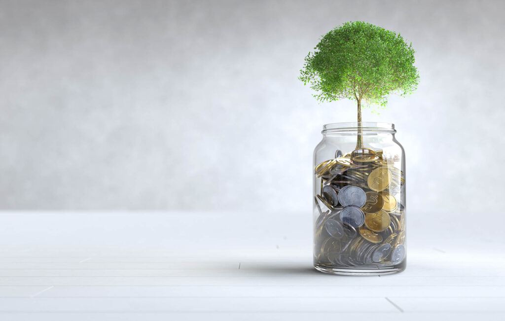 Гранти для малого бізнесу в Україні. Огляд програм - 2024 - tree grows coin glass jar with copy space